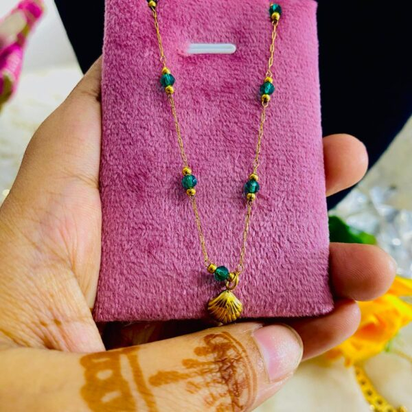 18k green pearl oyester neckpice
