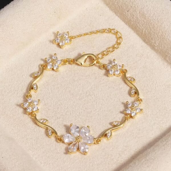 22 karet Gold Plated Diamond Cut Stainless Steel Flower white zircon gold bracelet.