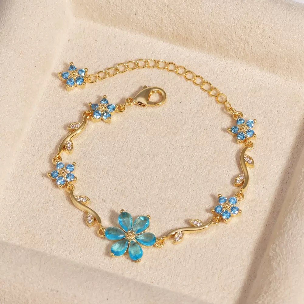 22 karet Gold Plated Diamond Cut Stainless Steel Flower Sky blue trendy bracelet.